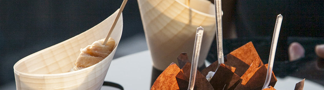 tasting cones with various snacks inside