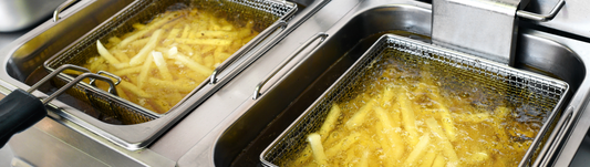 Fries deep frying in freshly filtered oil