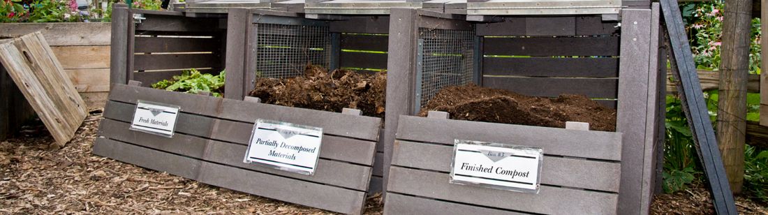 compost piles sorted by stage in process