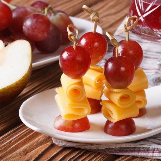 3.5" Bamboo Knot Picks Inserted in Cheese and Grapes