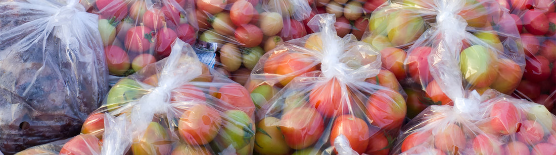 fresh apples in clear plastic food storage bags