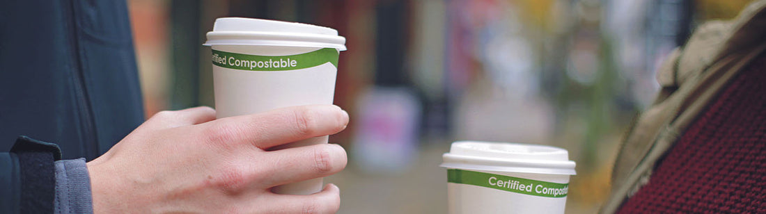 couple of pals having a couple o coffees in white hot cups