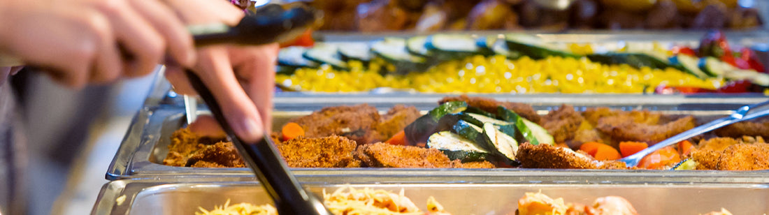 metal chafing dishes on a buffet table