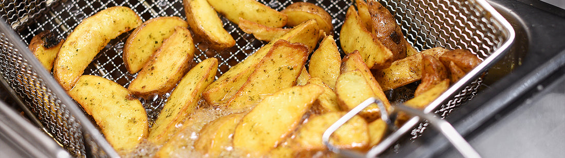 fresh potato wedges straight out of the fryer 