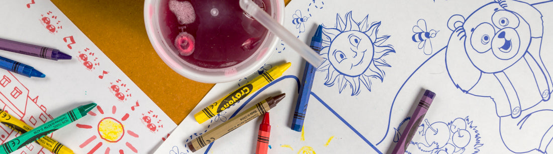 kids cup, crayons and coloring sheets