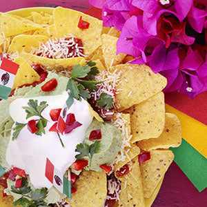 nachos on a yellow plate