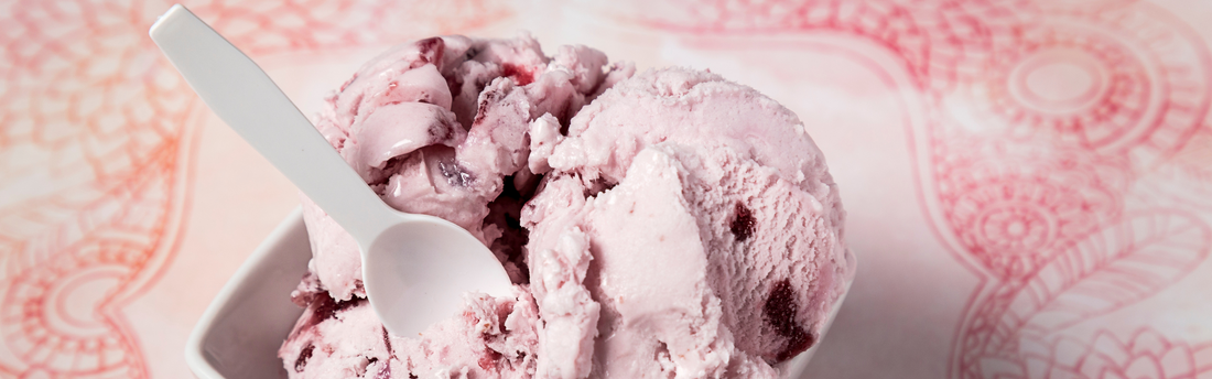 strawberry icecream with a taster spoon inside