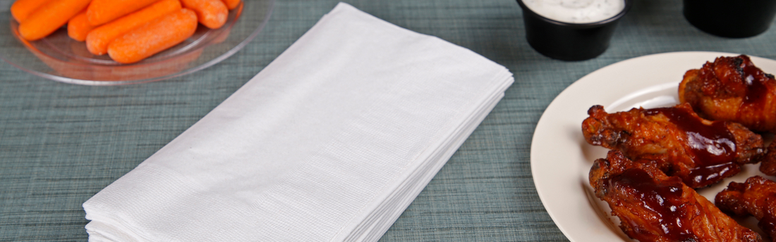 stack of white 2 ply napkins