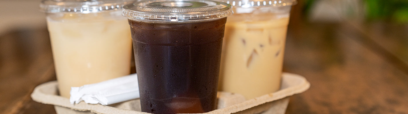 cold drinks in clear plastic cups