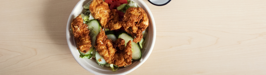 32 oz round no added PFAS molded fiber bowl with salad inside