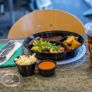 Take out dish with side portion cups, napkins and cutlery kit