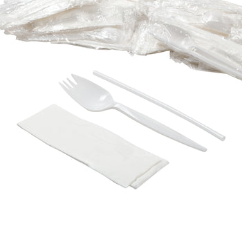 3 Piece Kit White Medium Weight Spork, 10" x 10" Napkin, Milk Straw unwrapped with wrapped kits behind it