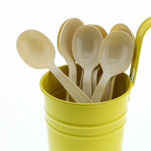Heavy Champagne Polystyrene Soupspoons in a yellow cup