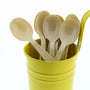 Heavy Champagne Polystyrene Soupspoons in a yellow cup