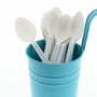Heavy Weight White Polypropylene Teaspoons in a blue cup