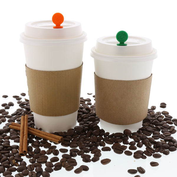 Circle Beverage Plugs inserted in Coffee Cups