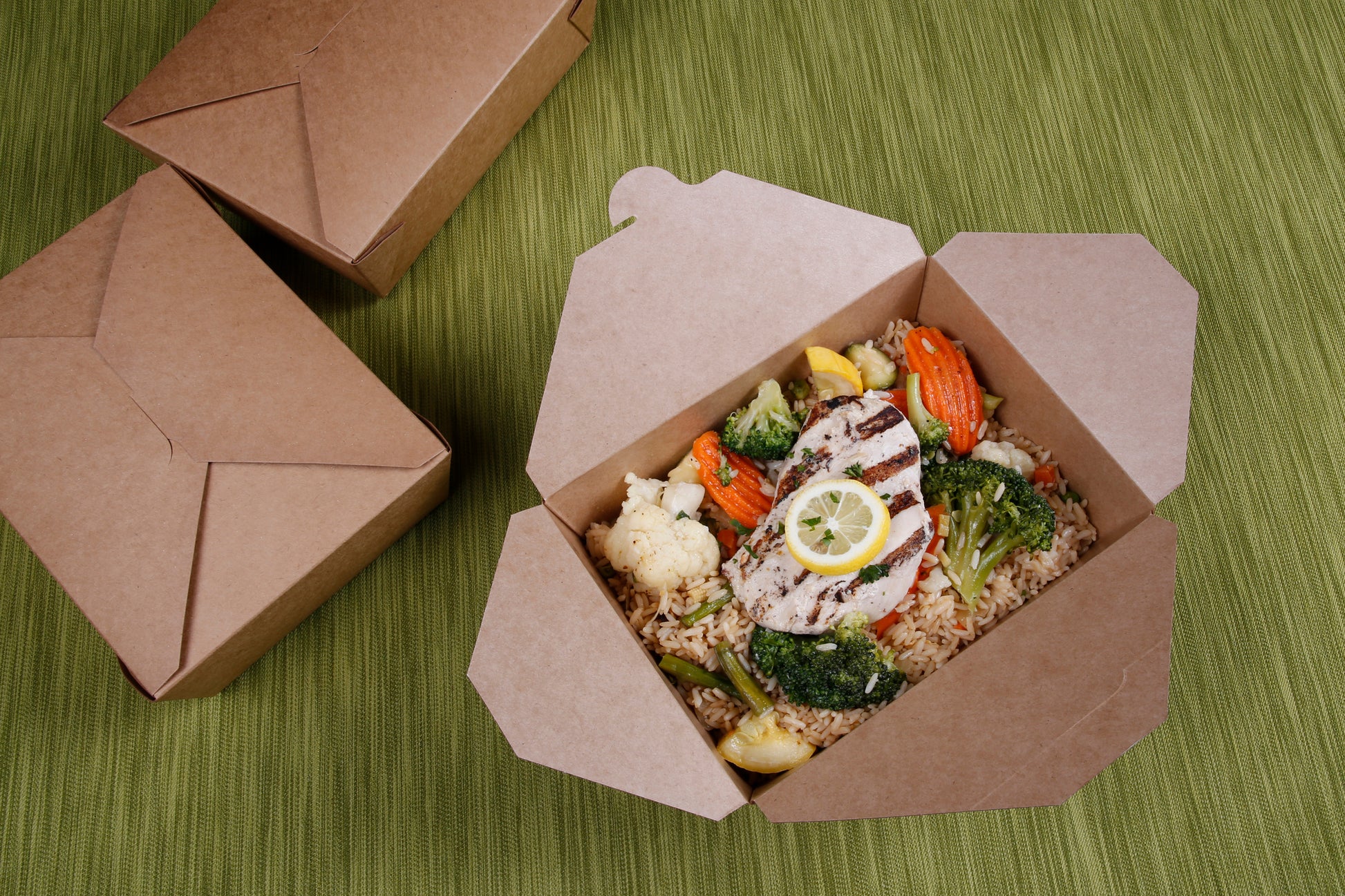 Rice, chicken and veggies in a 7-3/4" x 5.5" x 2.5" #3 Kraft Folded Takeout Box