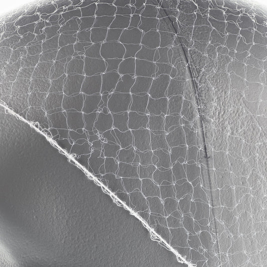 24" White Light Weight Hairnet Latex Free Closeup