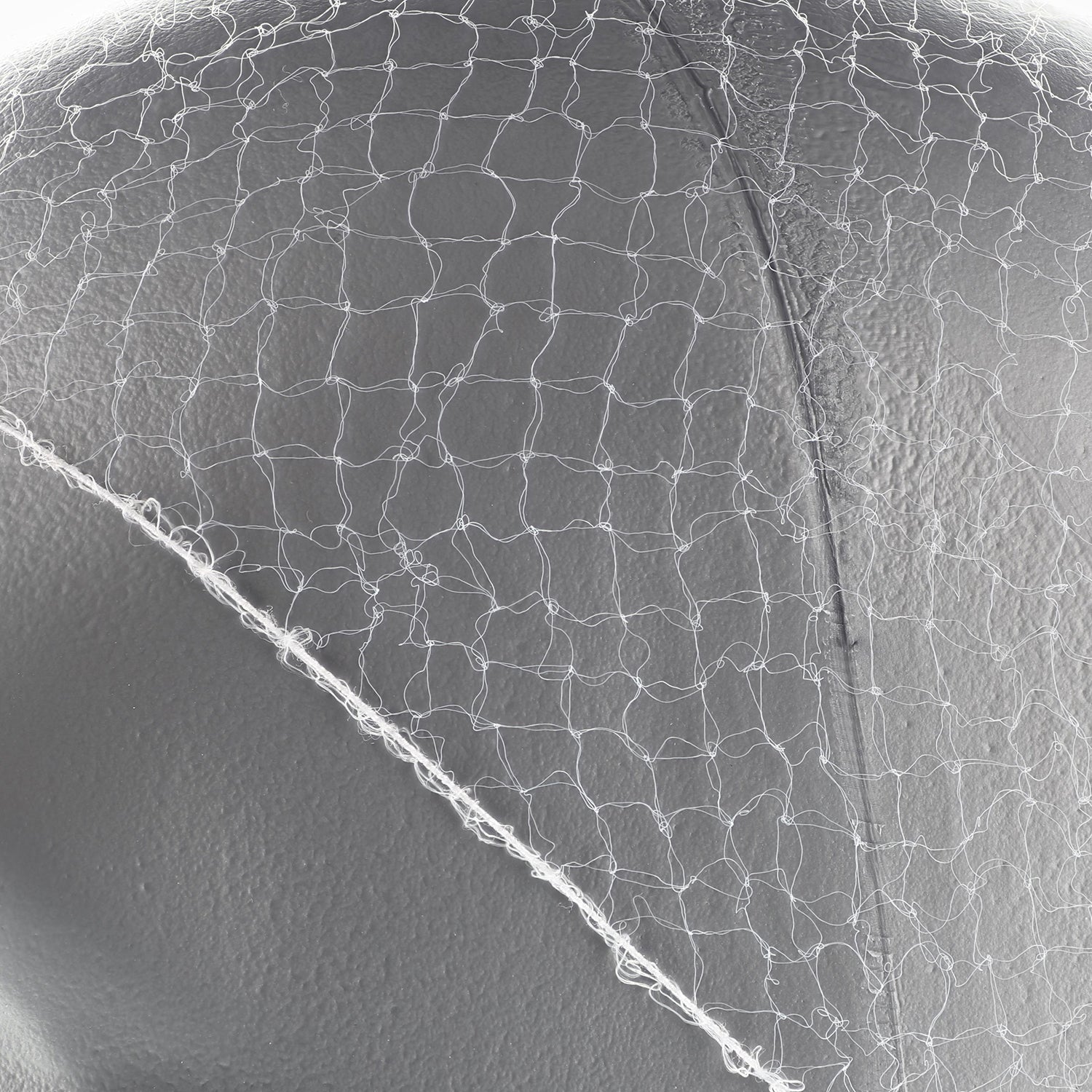 28" White Light Weight Hairnet Latex Free Closeup
