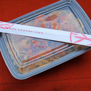 Takeout with Twin Bamboo Chopsticks in a Closed Sleeve on top