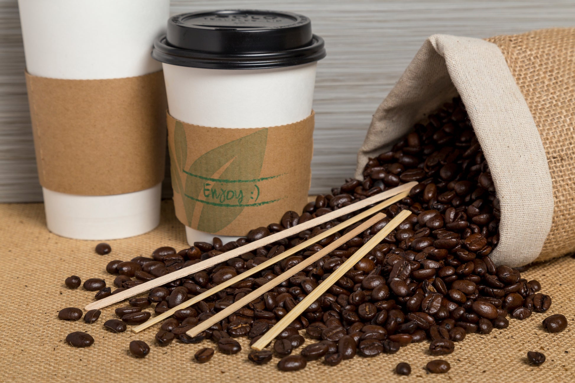 spilled back of coffee pins with 7" Bamboo Coffee Stirrers on top